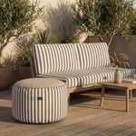 Détail tissu pouf beige