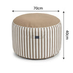 Ambiance jardin avec pouf beige