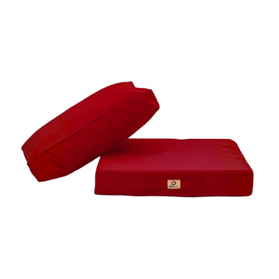 Détail tissu coussin rouge