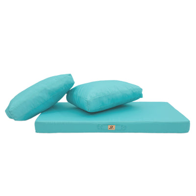 Ensemble de 3 coussins de salon jardin bleu Caraïbes, déhoussables et anti-UV, pour fauteuils et canapés, 120x60 cm.