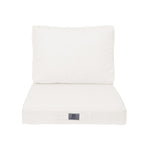 Ensemble de coussins pour fauteuils en lin blanc cassé, déhoussables, pour assise et dossier, de style élégant et confortable.