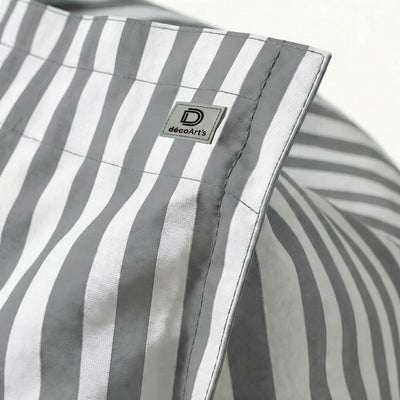 Détail tissu pouf gris clair