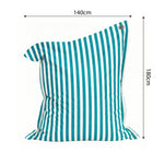 Ambiance jardin avec pouf turquoise