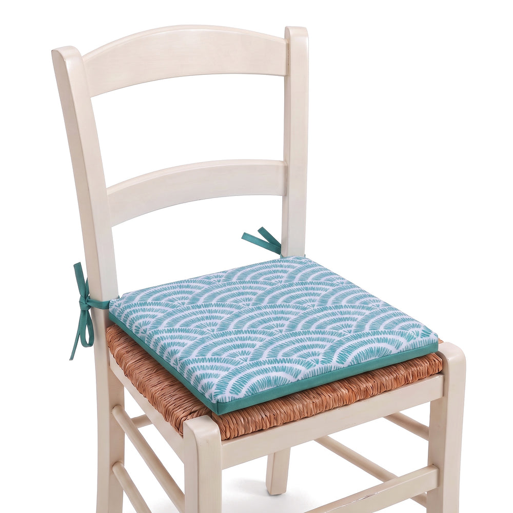 Cuscino per sedia 35x35 Motivo Ventagli Verdi legato a una sedia