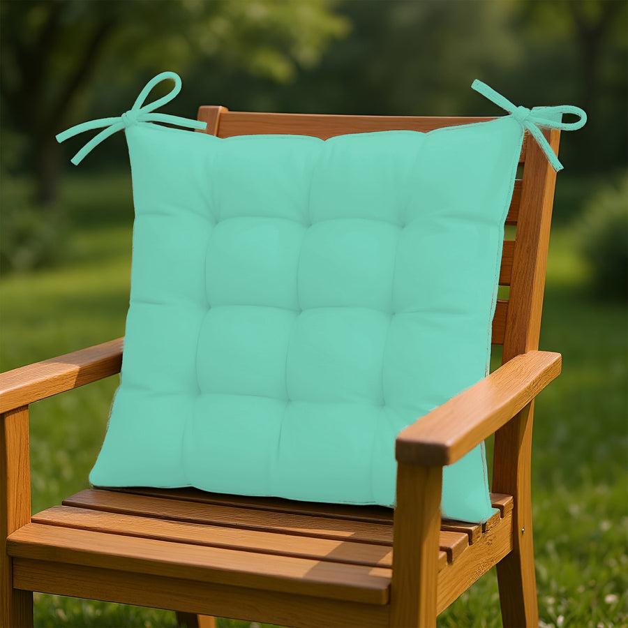 Set de 4 galettes de chaise vert menthe 40x40 cm, déperlantes avec attaches pour intérieur et extérieur.
